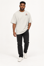 SLOPCANNON Snout Oversized Tee — Faded Bone — worn by a model