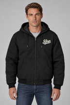 Man wearing the Slop Script Duck Work Jacket in Black