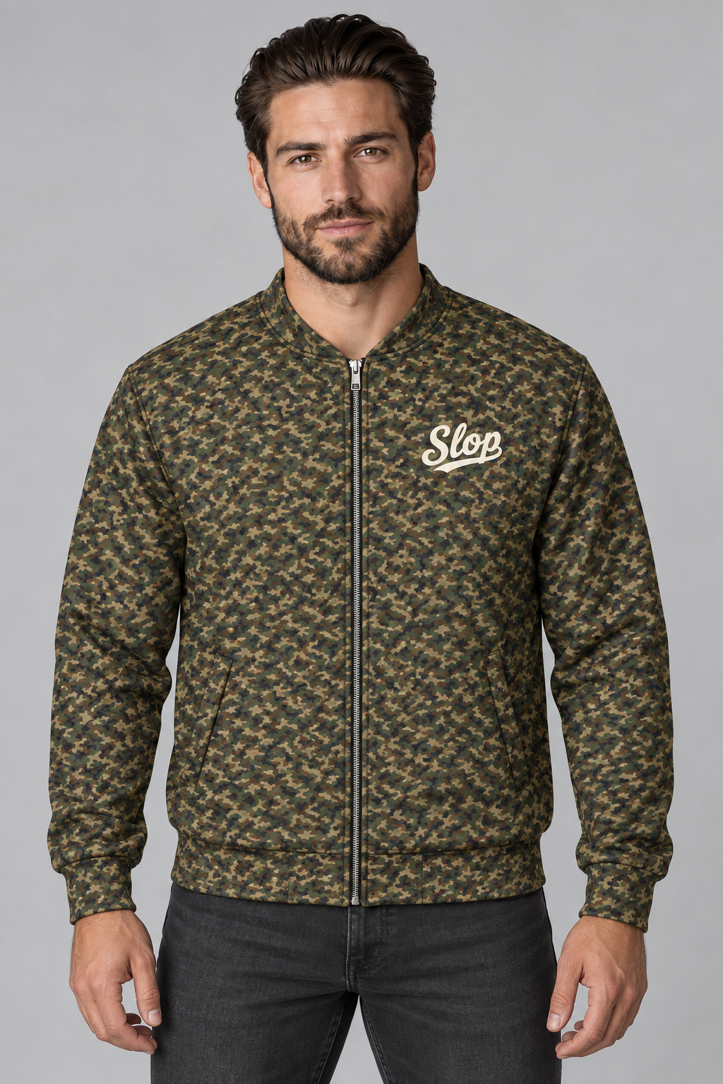 Man wearing the Slop Script Bomber Jacket in Woodland Camo, front