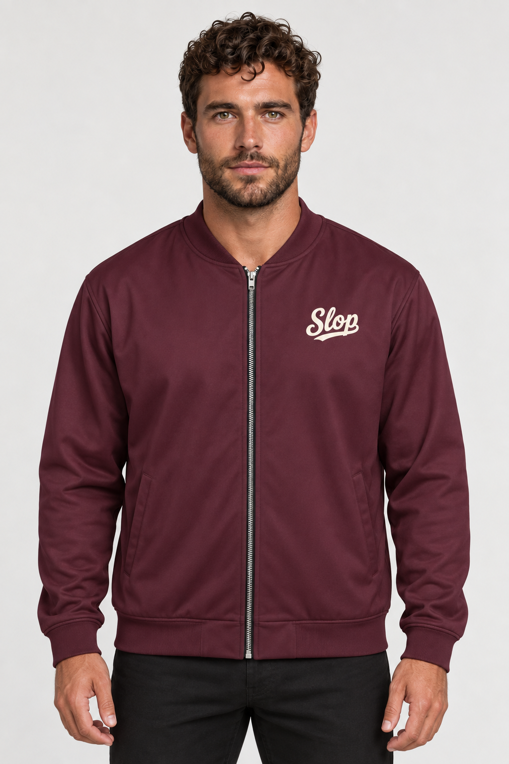Man wearing the Slop Script Bomber Jacket in Oxblood