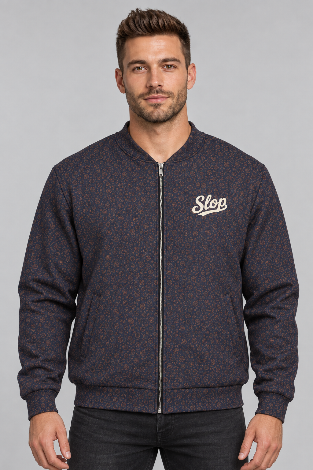 Man wearing the Slop Script Bomber Jacket in Midnight Copper Paisley
