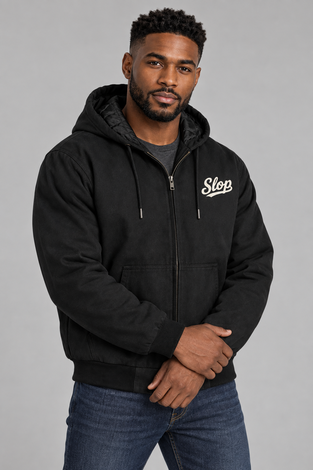 Man wearing the Slop Script Duck Work Jacket in Black