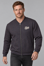 Man wearing the Slop Script Bomber Jacket in Midnight Copper Paisley