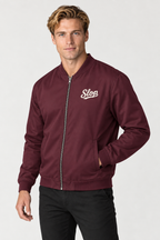 Man wearing the Slop Script Bomber Jacket in Oxblood