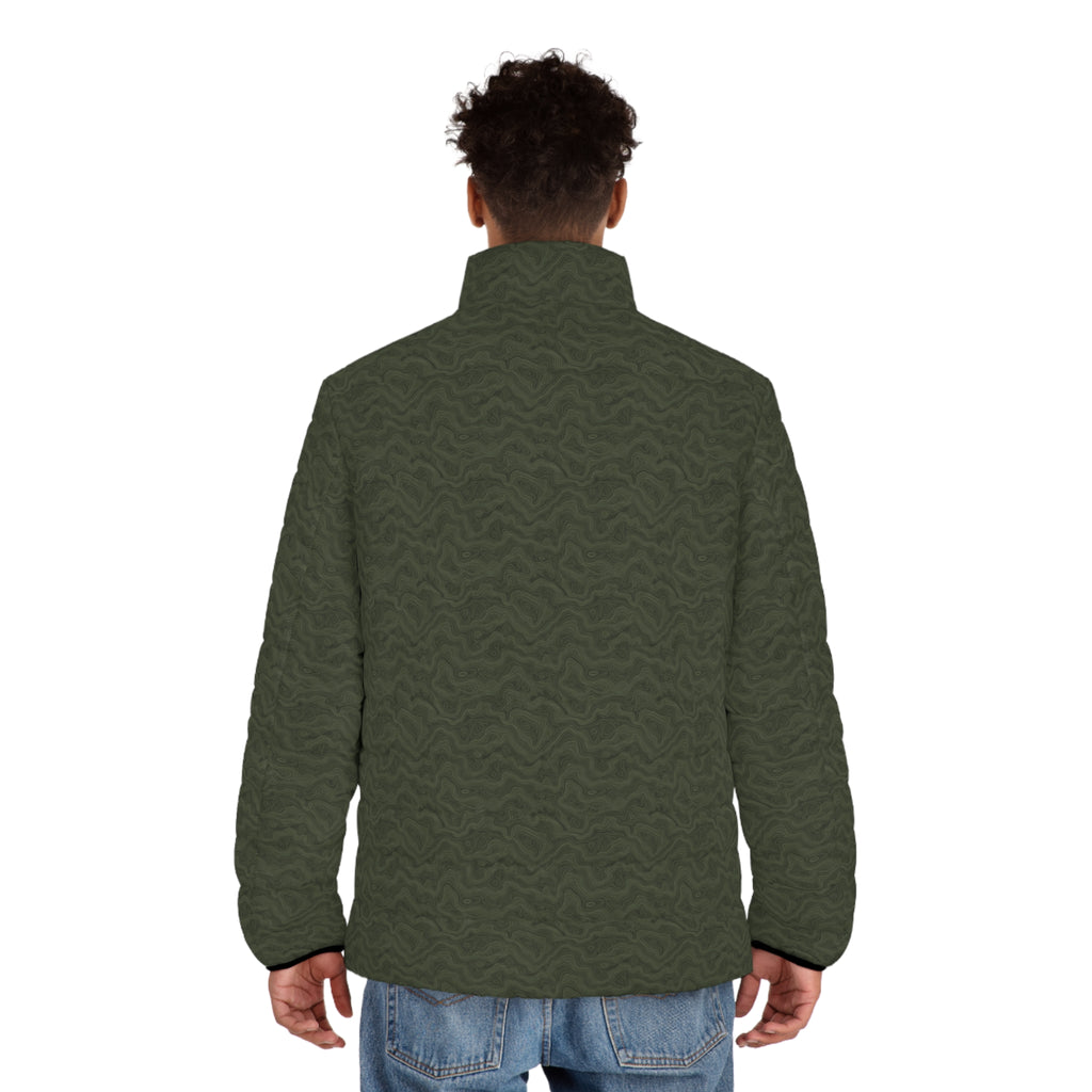 Model wearing the Slop Script Puffer Jacket in Olive Topo, back view