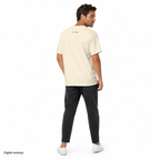 Fill Er Up Tee — Ivory — CW-M02 male model wearing the actual tee, rear three-quarter view with small nape print. Digital mockup.