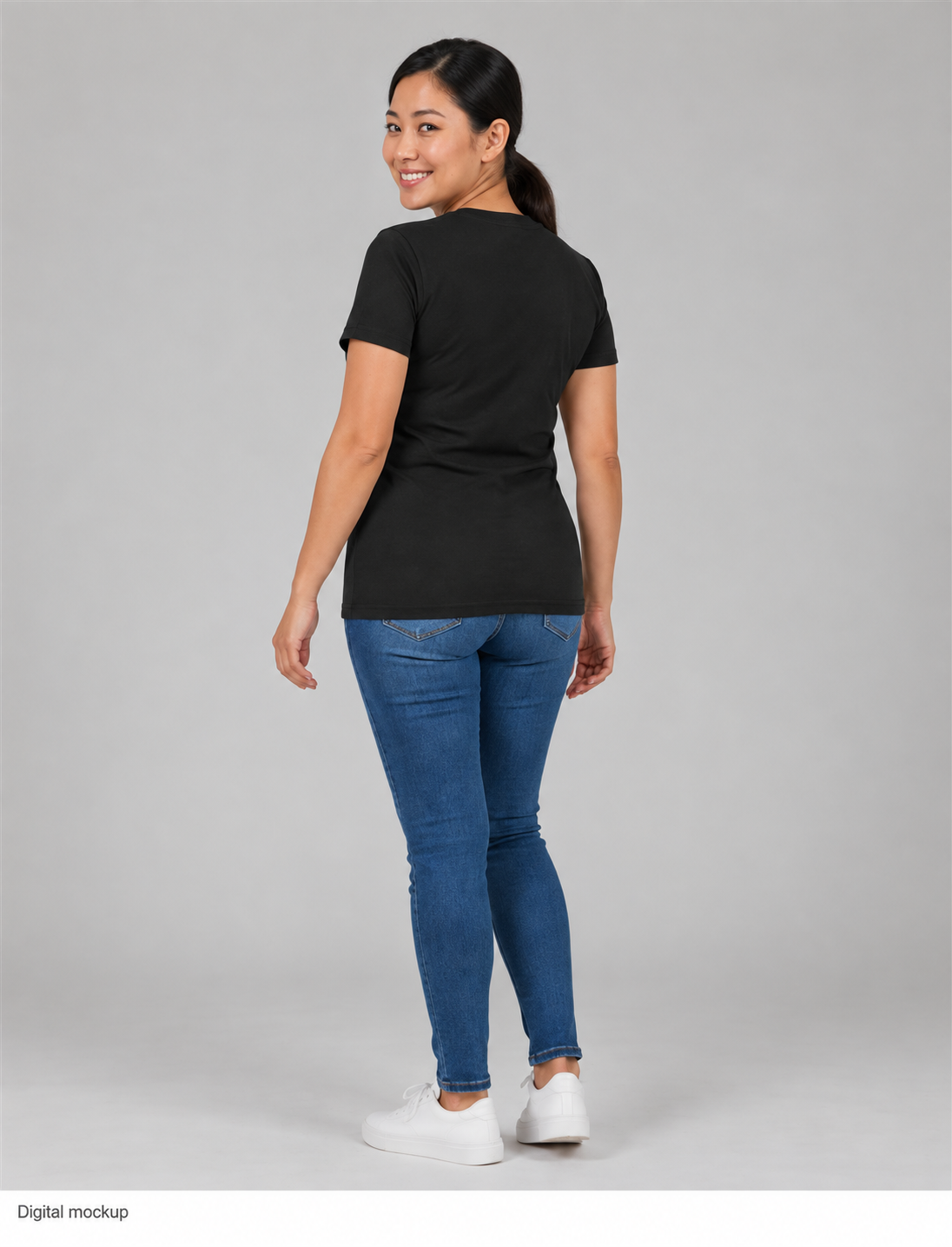 Slop Cannon Loaded Women's Tee — Black — fictional adult model rear three-quarter view; exact women's tee construction; plain rear with configured front artwork not visible; roster identity XF1; generated digital mockup, not a manufactured sample; tee only; styling jeans and shoes excluded.