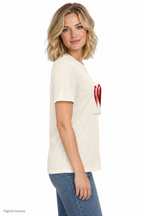 Slop Cannon Heart Fuse Women's Tee — Natural — fictional adult model side view; exact Bella + Canvas 6400 garment and configured front artwork; roster identity CW-F14; generated digital mockup, not a manufactured sample; tee only; styling jeans excluded.