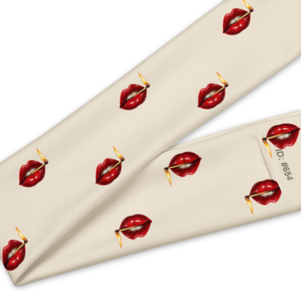 Slop Cannon Play With Fire Headband — Ivory — print and seam detail; one straight headband; printed straight polyester/elastane band; supplier digital mockup.
