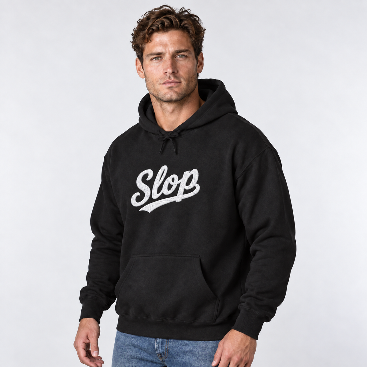 Model wearing the black Slop script embroidered hoodie with white stitching.