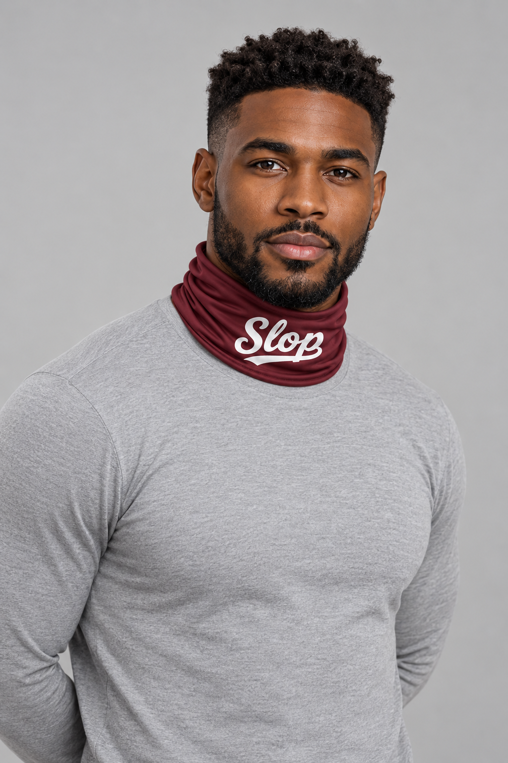 Slop Script Neck Gaiter in Burgundy, worn by a model
