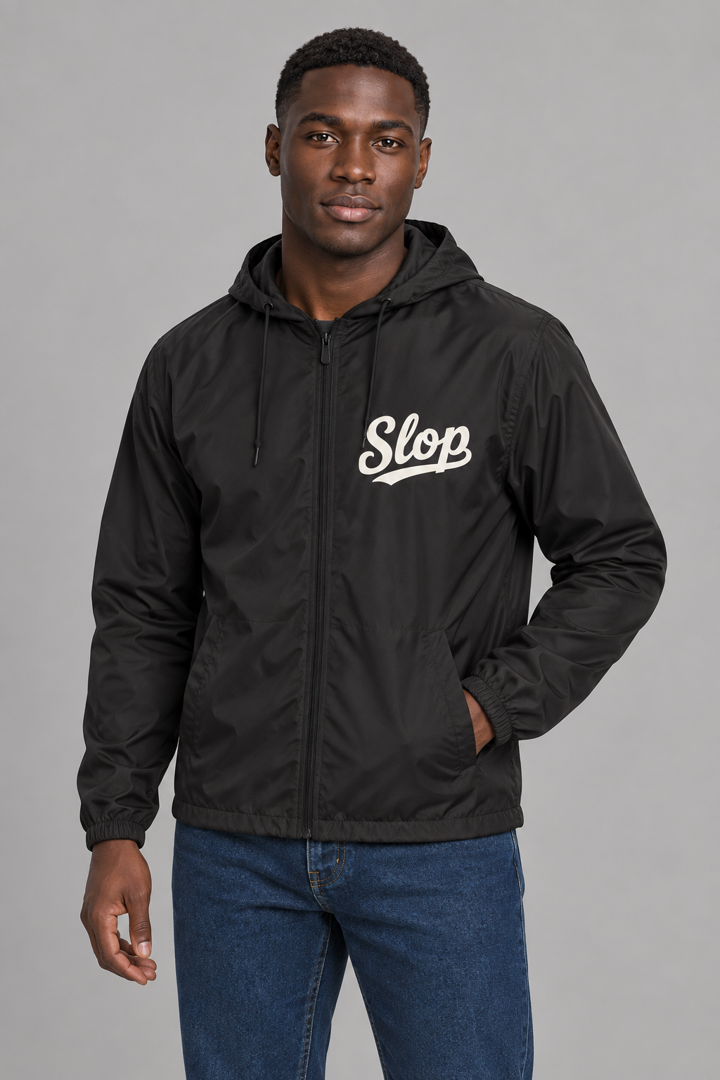 Digital mockup: 098 black AA M02 standing v1; actual EXP54LWZ windbreaker, cream Slop on wearer-left chest only.