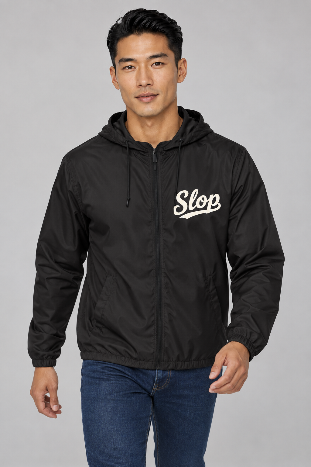Digital mockup: 098 black EA M01 walking v1; actual EXP54LWZ windbreaker, cream Slop on wearer-left chest only.