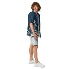 Cannon Coast Beach Button-Up — Navy / Cream — three-quarter model view with plain navy sleeve; shirt only; Printful all-over-print unisex button-up shirt Navy and cream all-over print; supplier digital mockup.