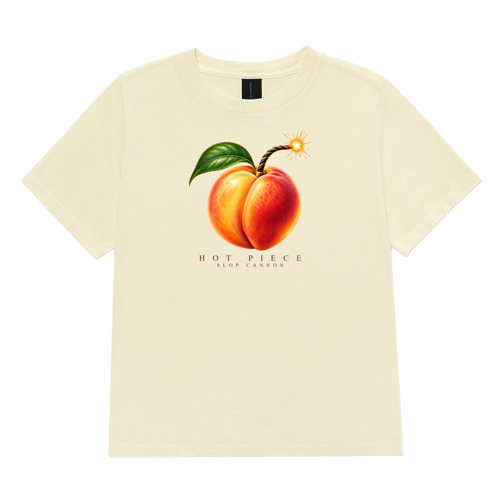 Hot Piece women's tee — Buttermilk — full front with approved artwork; Women's Heavyweight Garment Dye Tee | Bella + Canvas 6110GD Buttermilk; supplier digital mockup.