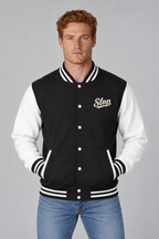 Man wearing the Ivory Script Varsity Jacket in Jet Black/Arctic White