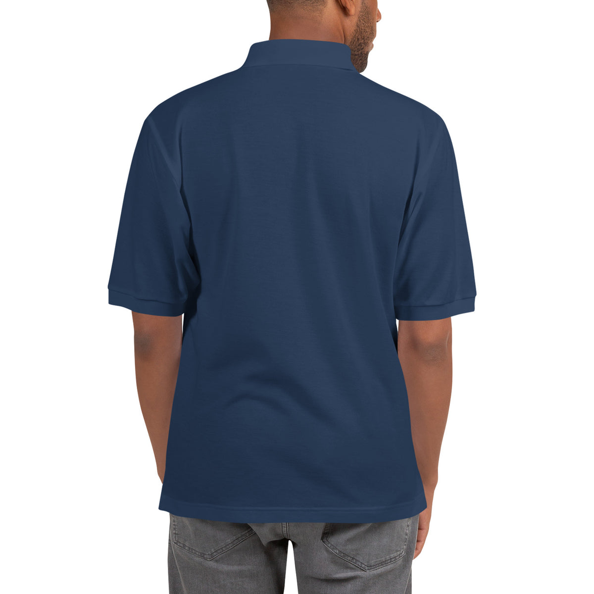 Slop Script Polo in Navy, close-up of the embroidery