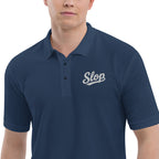 Slop Script Polo in Navy, close-up of the embroidery