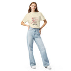 Muse Hotline ivory tee worn by a model, styled front view