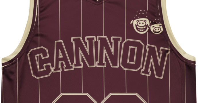 Cannon Boyz Pinstripe Jersey — Burgundy / Bone — complete CANNON wordmark and crest detail cropped from the supplier digital mockup; Printful catalog 676 recycled polyester V-neck basketball jersey Burgundy / Bone; supplier digital mockup.