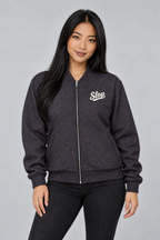 Woman wearing the Slop Script Bomber Jacket in Midnight Copper Paisley