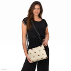 Slop Cannon Cherry Fuse Repeat Crossbody Bag — Cream / black trim — CW-F05 adult woman model view; exact configured bag, straps and artwork; digital model composite; accessory only, outfit excluded.