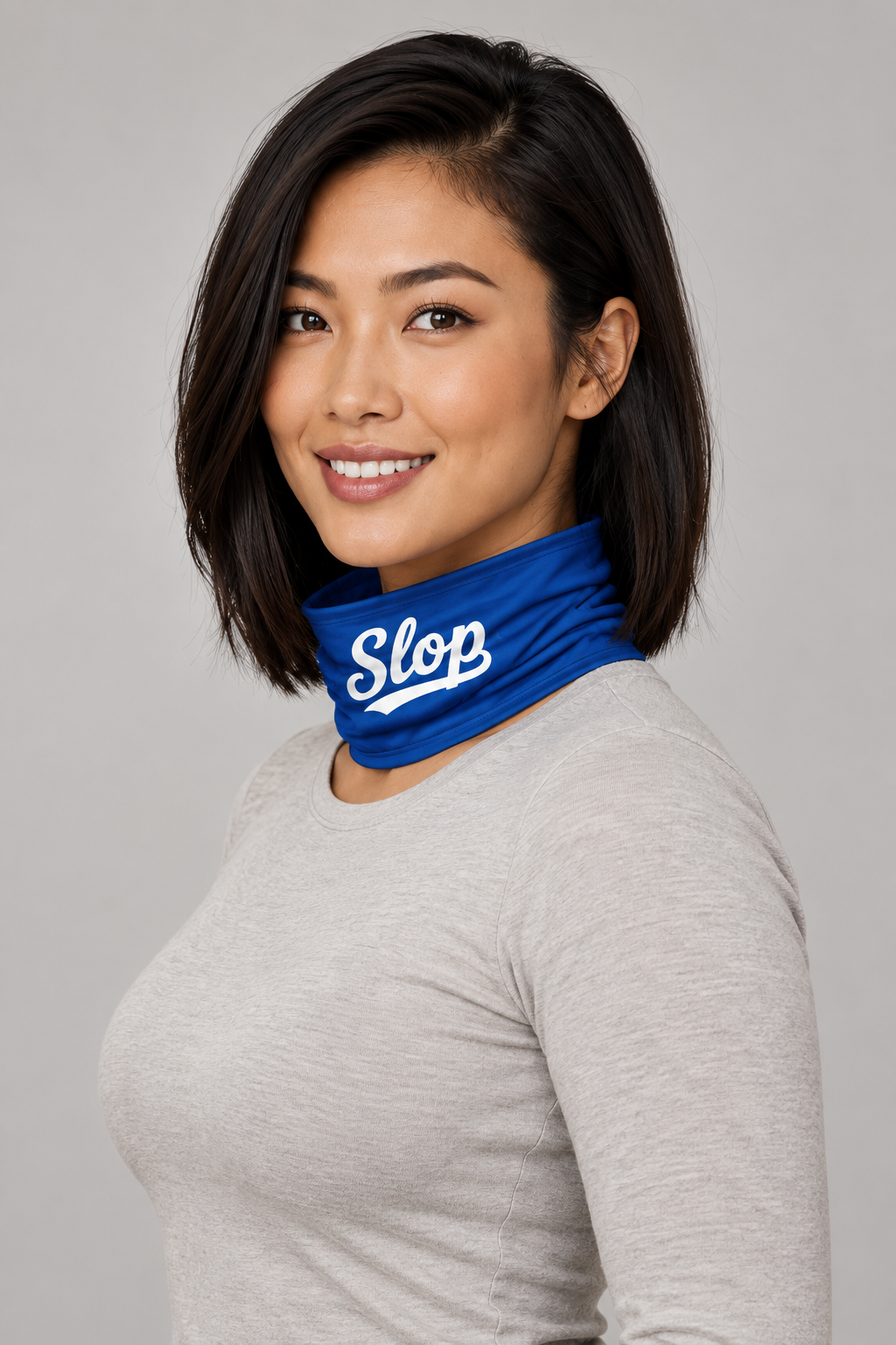 Slop Script Neck Gaiter in Royal Blue, worn by a model, back view