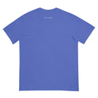 Smoke Signal tee — Flo Blue — full back with cream outside-neckline wordmark; remaining back and sleeves plain; Comfort Colors 1717 garment-dyed heavyweight tee; actual configured Flo Blue; tee only. Supplier digital mockup.