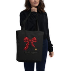 Short Fuse tote — Black — model carrying the tote with approved front artwork; tote only, clothing not included; Econscious EC8000 organic cotton tote; supplier digital mockup.