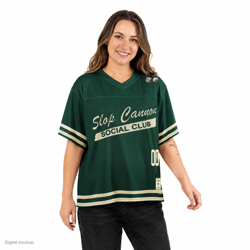 Slop Cannon Social Club Women's Jersey — Forest / Cream — adult female front model view; exact Printful boxy V-neck football jersey and configured all-over artwork; local identity composite checked against supplier source; digital mockup; jersey only.