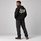 Andre wearing the Black SLOP Work Zip Hoodie in a rear three-quarter view