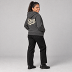 Marisol wearing the Charcoal Heather SLOP Work Zip Hoodie in a rear three-quarter view