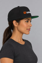 SLOPCANNON Wordmark Flat-Brim Snapback, worn by a model, back view
