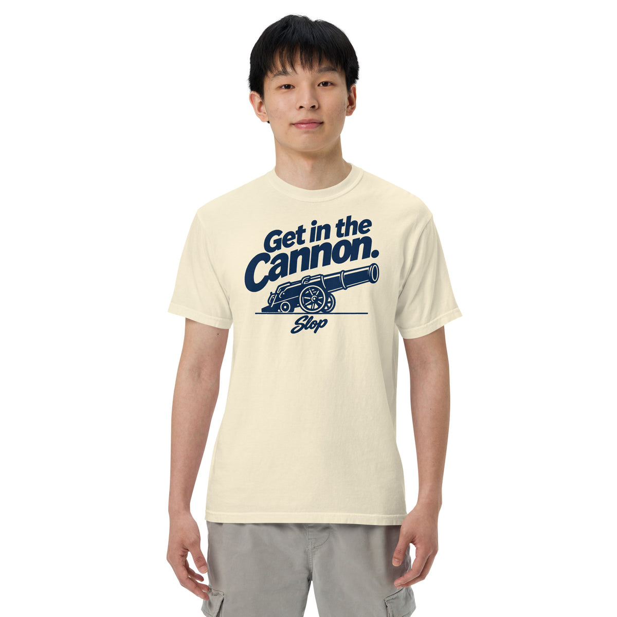 Man wearing the Get in the Cannon Tee in Ivory