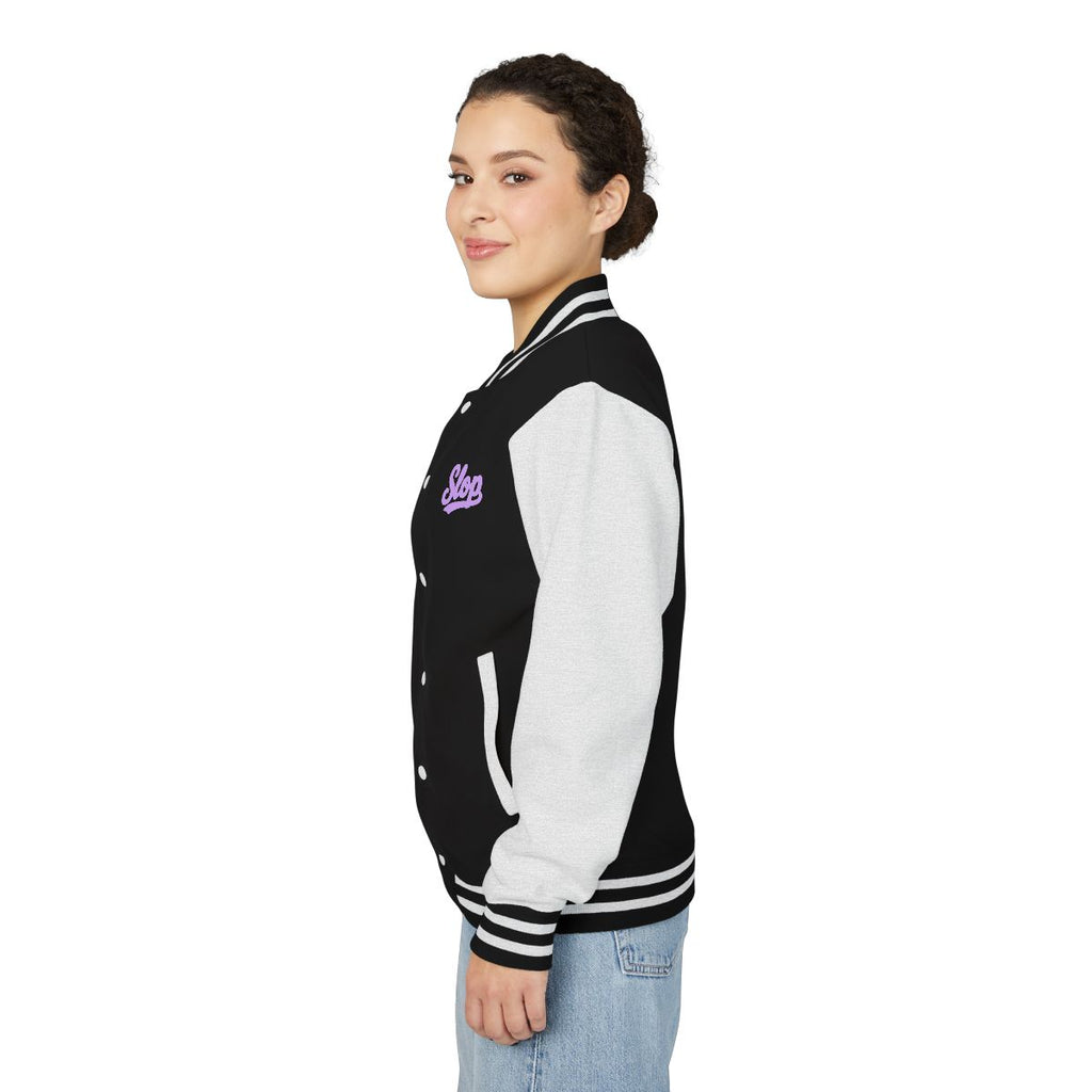 Woman wearing the Lilac Script Varsity Jacket in Jet Black/Arctic White, side view