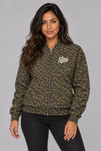 Woman wearing the Slop Script Bomber Jacket in Woodland Camo